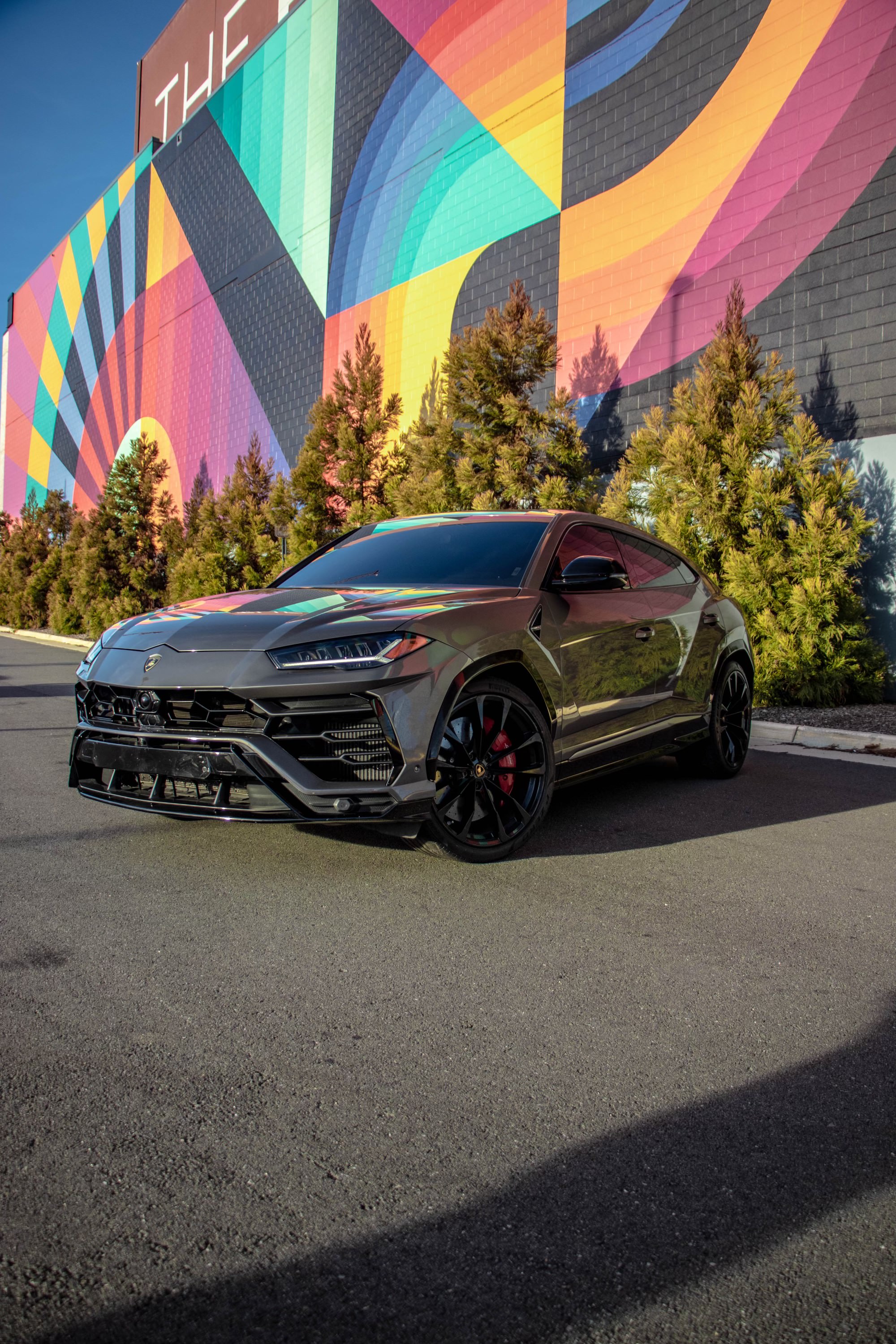 space grey 2023 Lamborghini Urus in an outdoor parking garage